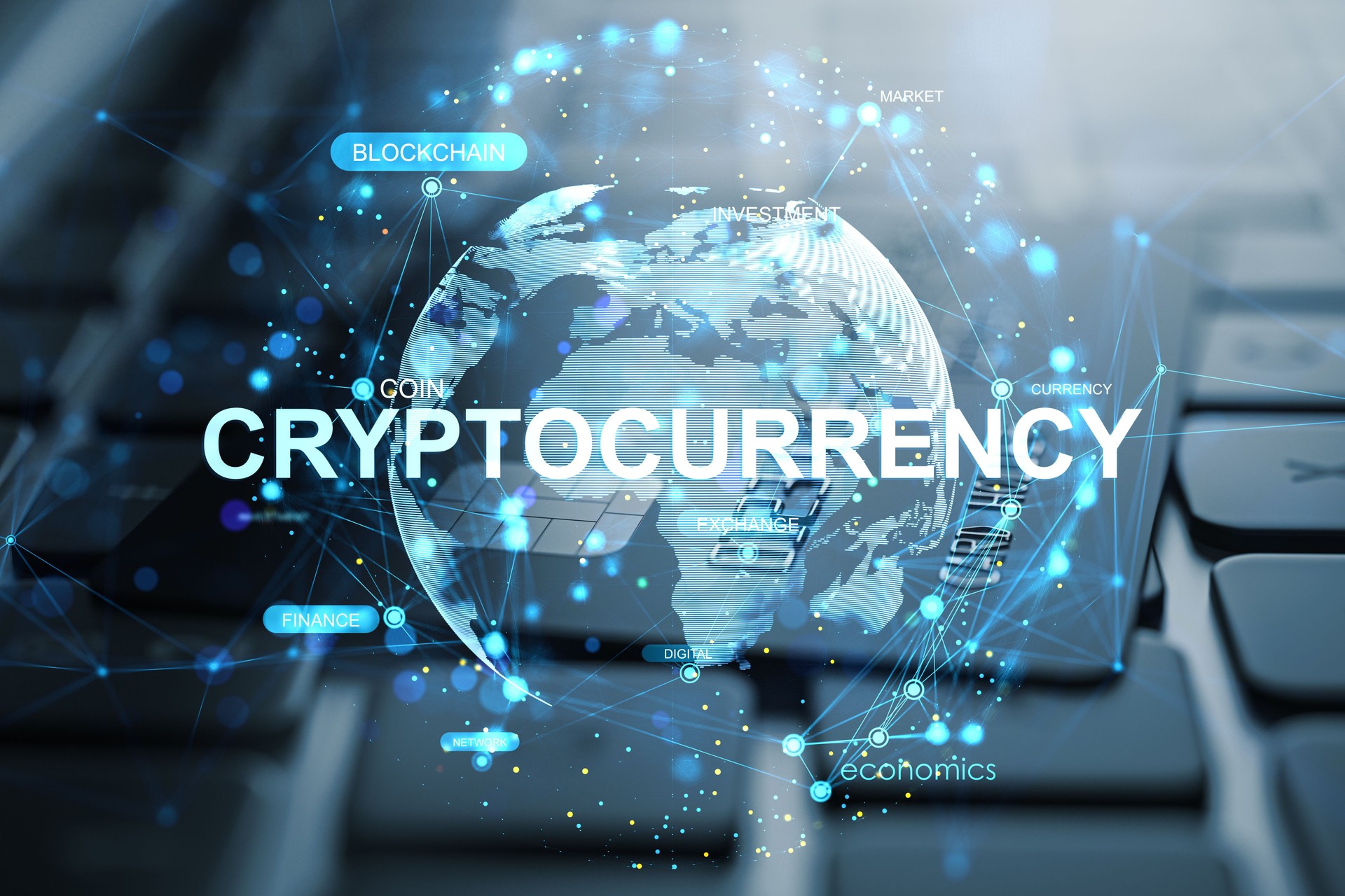 Futuristic digital concept of cryptocurrency and blockchain network over world map on keyboard background in modern financial technology theme.
